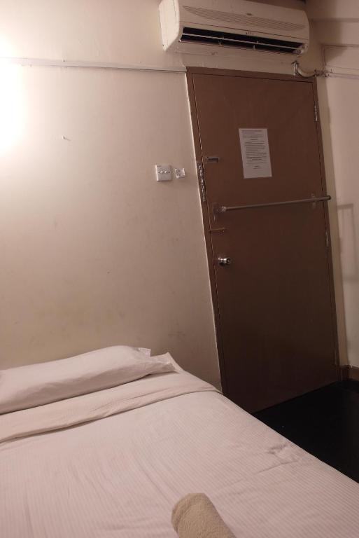 Number Eight Guesthouse Куала Лумпур Стая снимка